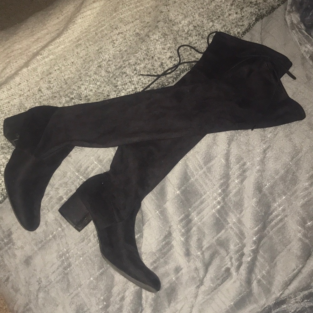Thigh high boots. Over the knee black boots